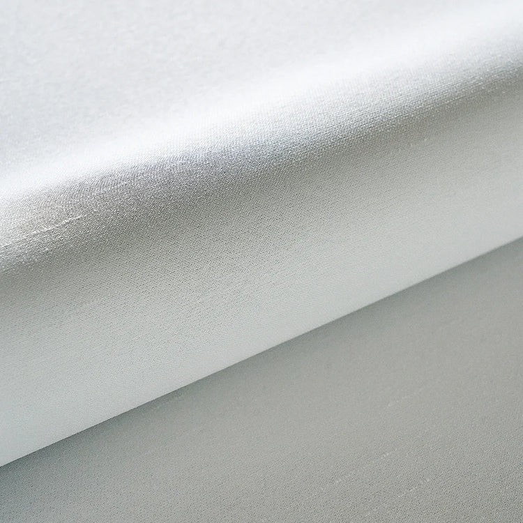 Close-up of gray fabric with a subtle texture