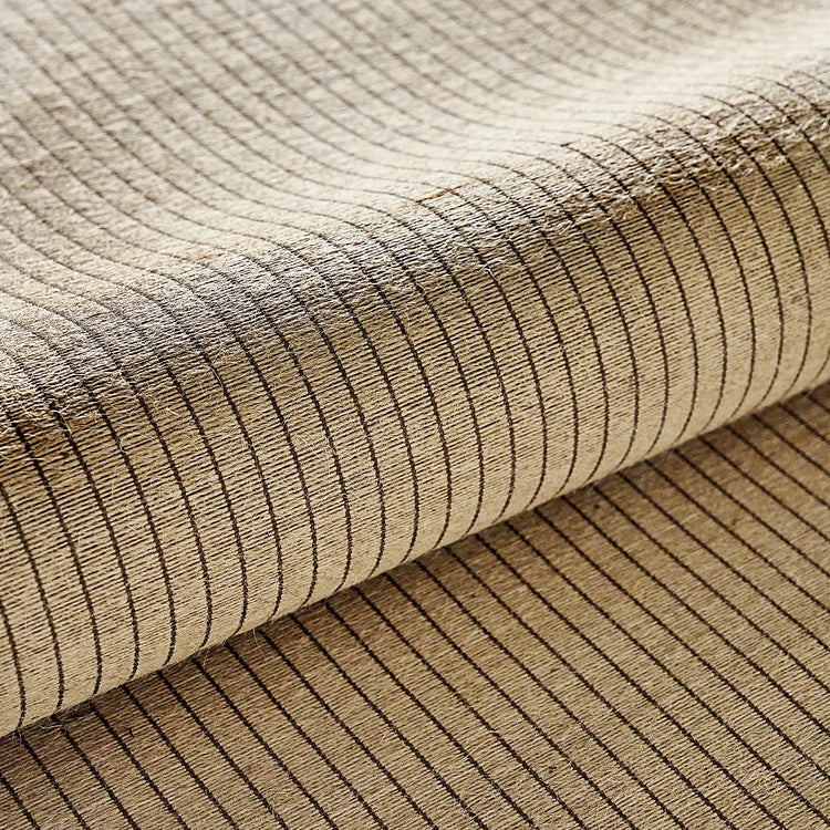 Close-up of a textured brown fabric roll