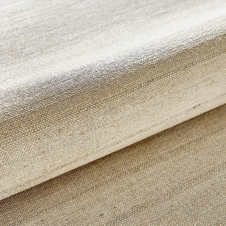 Close-up of beige fabric with a textured surface