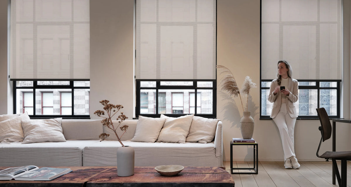 a wide living with motionblinds Motorized Roller Shades 