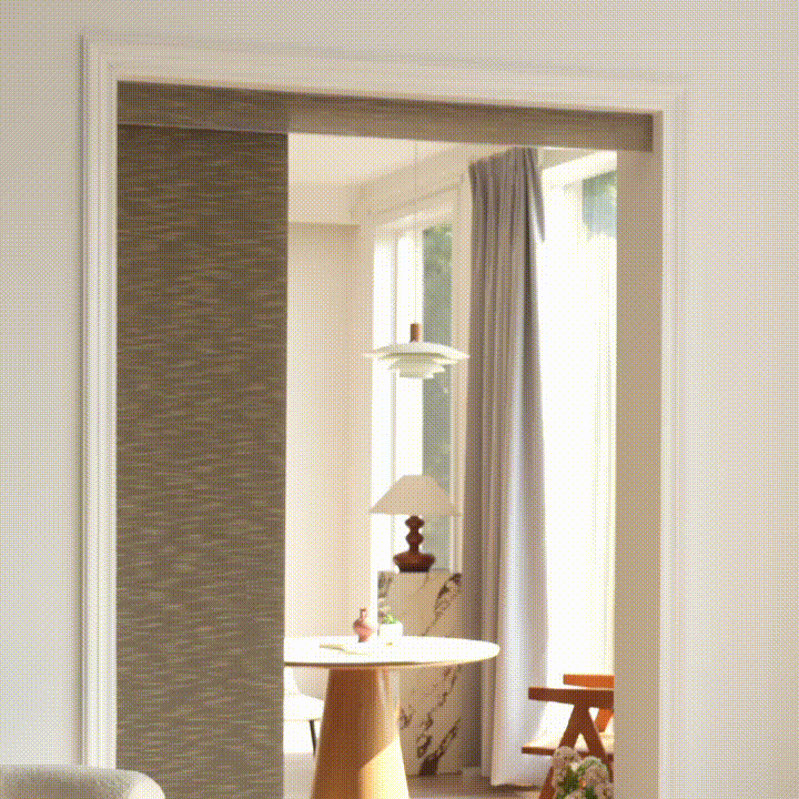 The motorized panels move smoothly along the track and close with minimal effort, offering convenient coverage for wide windows and patio doors.