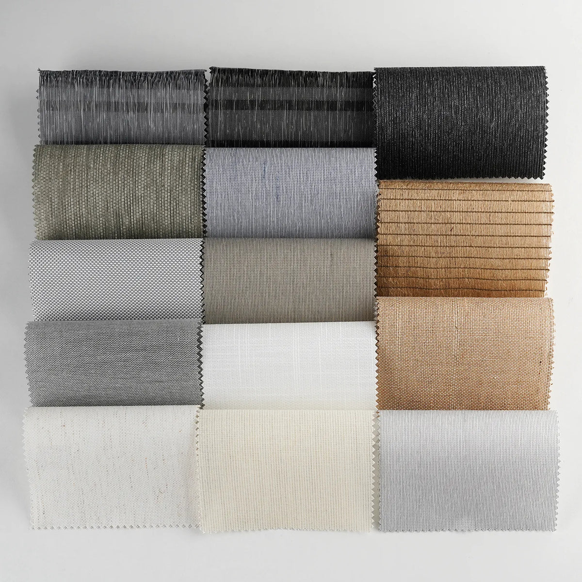 Premium Light Filtering Panel Track Blinds fabric options with different woven patterns