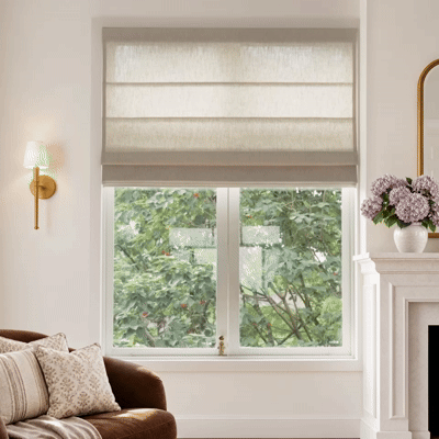 Animation of motorized plain fold roman shades raising and lowering on a window.