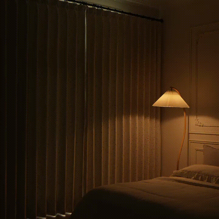 The room-darkening curtains open smoothly to reveal the window, bringing natural light into the room while maintaining an elegant, tailored appearance.