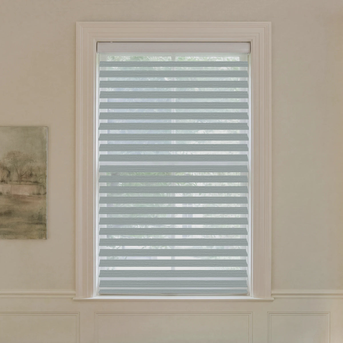 Graywind motorized room-darkening Shangrila shades in 2 1/2-inch striped misty blue fabric.