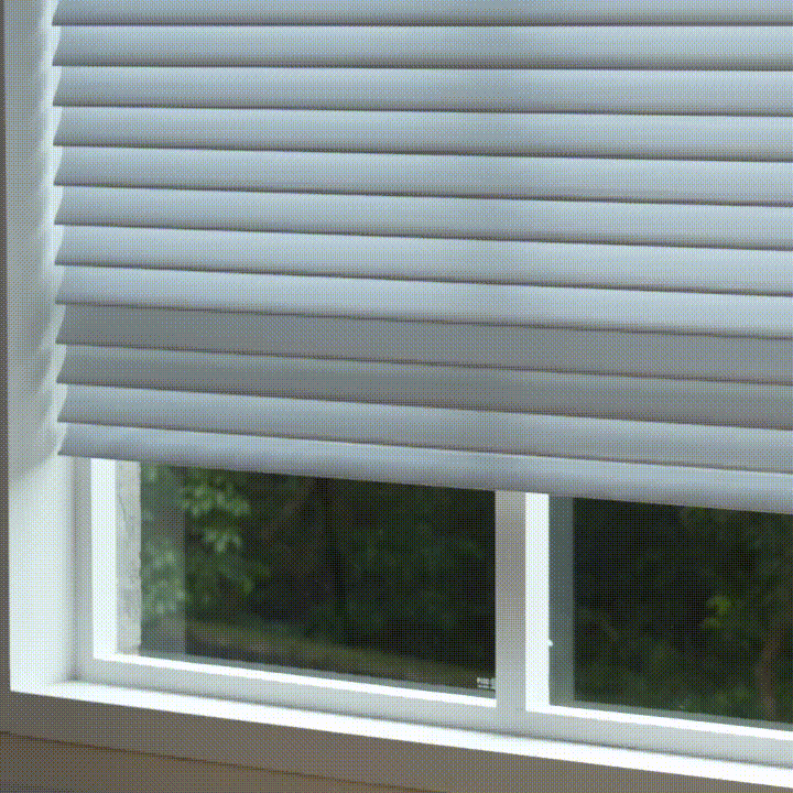 The soft fabric vanes close smoothly to increase privacy and soften incoming light while preserving the shade’s elegant layered appearance.