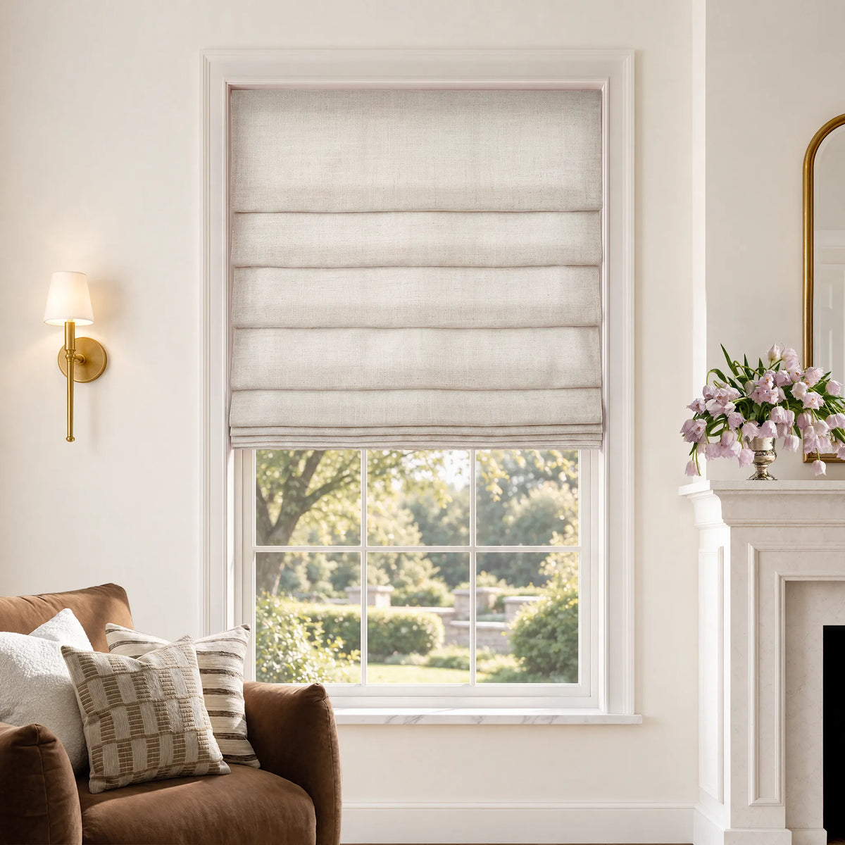Soft fold Roman shades in Hush Beige light-filtering fabric, partially raised to show cascading folds.