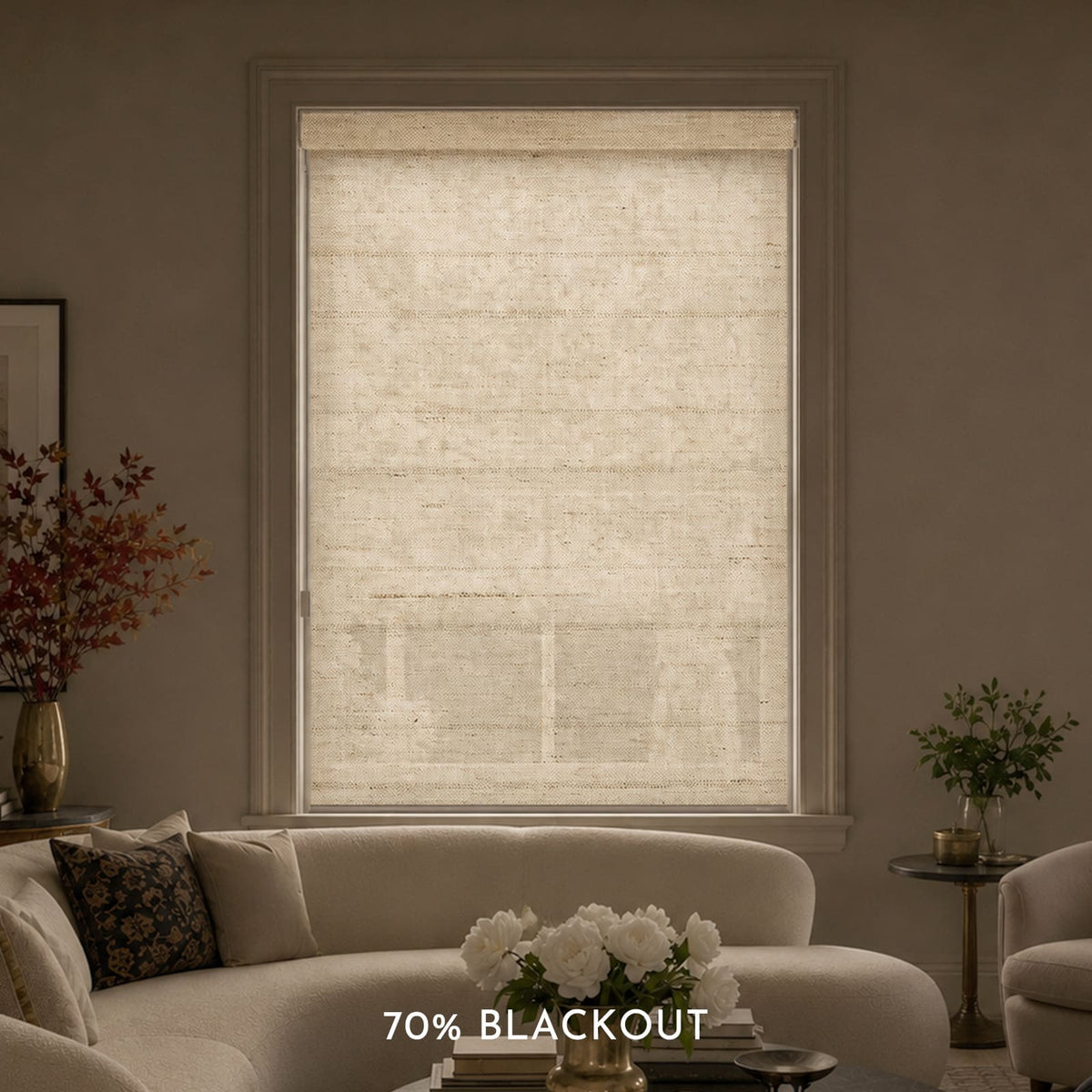 Living room with a window featuring a 70% blackout blind, beige sofa, and decorative elements.
