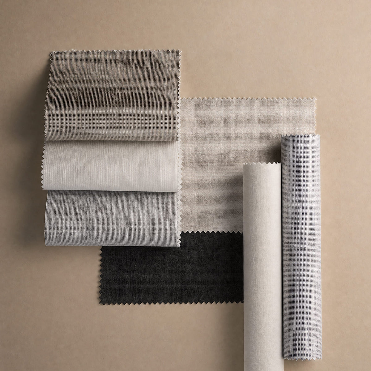 Collection of fabric swatches in various textures and colors on a beige background