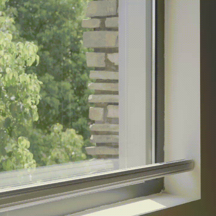 The cellular shade raises from the bottom while the upper portion remains positioned for a flexible balance of daylight, privacy, and insulation.